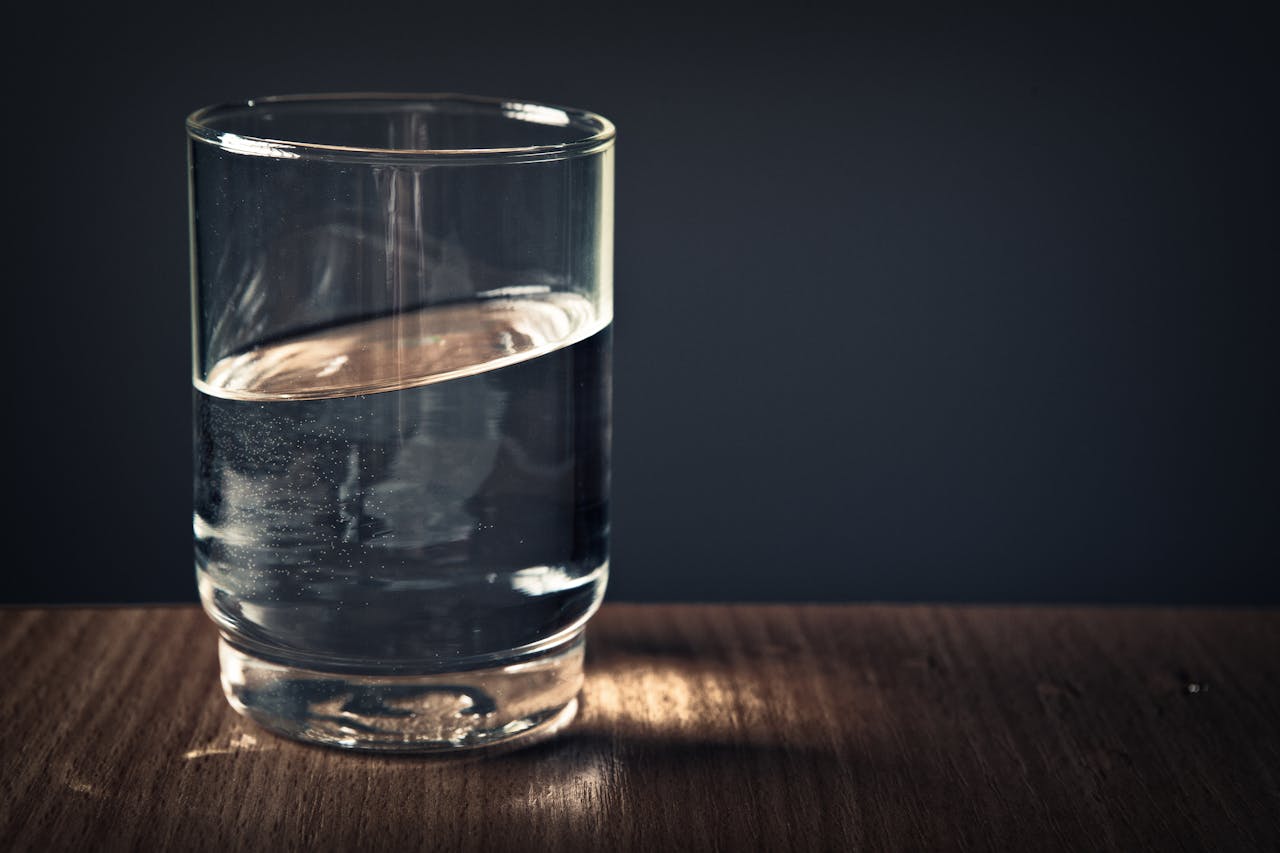 A glass of water to symbolize hydration by performH2O